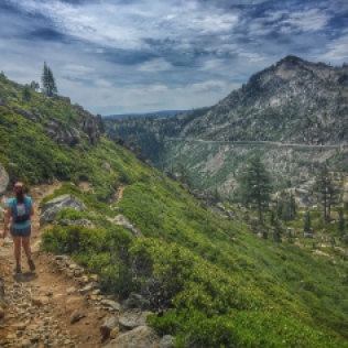 Gretchen heading down the PCT towards Donner Pass